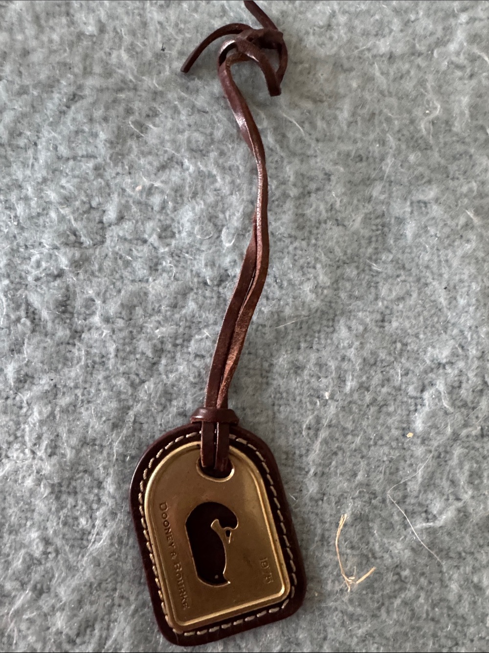 Dooney & Bourke Solid Brass and Leather bag tag